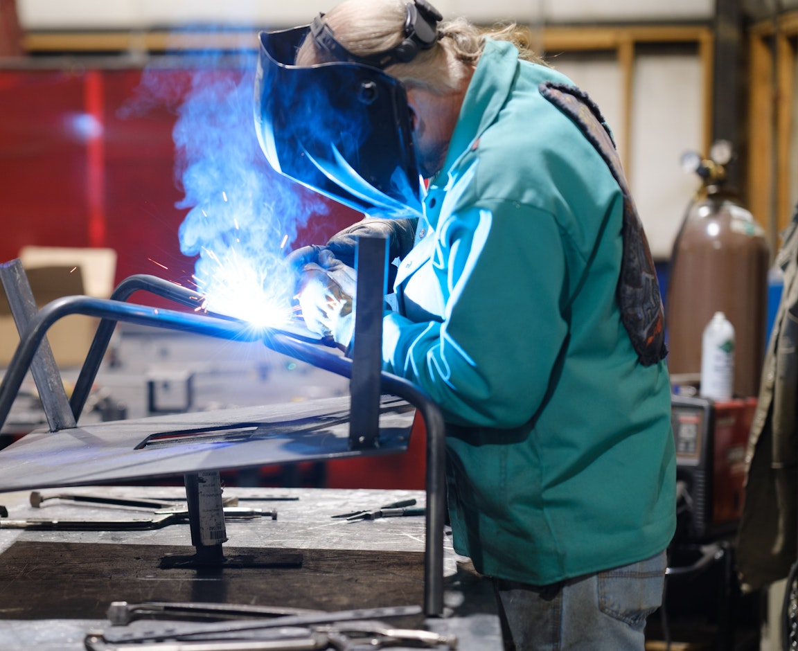 Fabritech employee welding